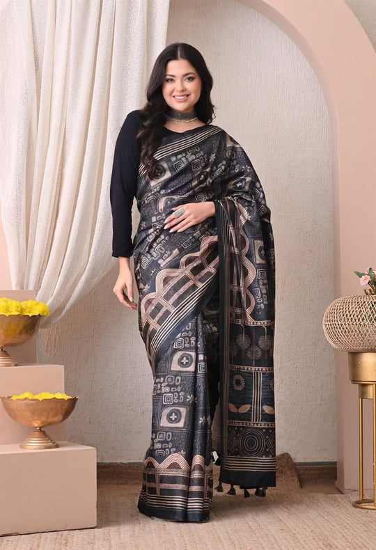 Woman wearing a Batik Print in Navy Blue saree.