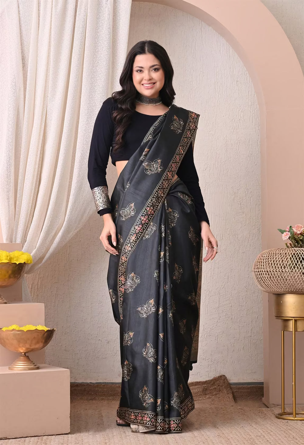Woman in Black Colour Butterfly Ajrakh Butti Printed saree.
