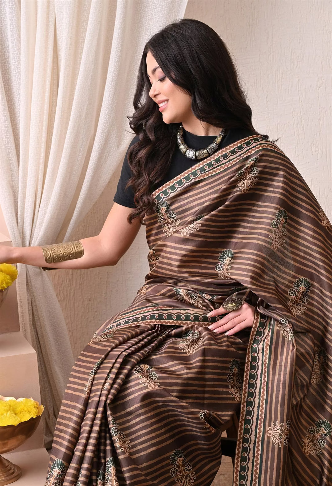 Ajrakh Butta With Stripe pattern in Brown colour saree for woman by Ethnic Today.