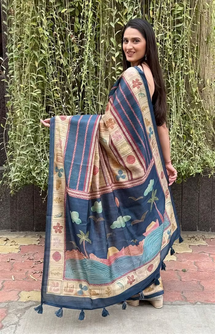 Woman in Blue Katha Pattern Wave Pallu saree.