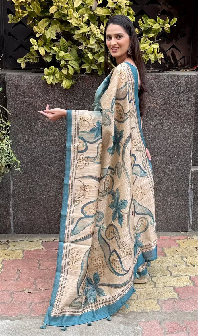 Woman in Cyan & Beige Botanical Soft silk saree. 