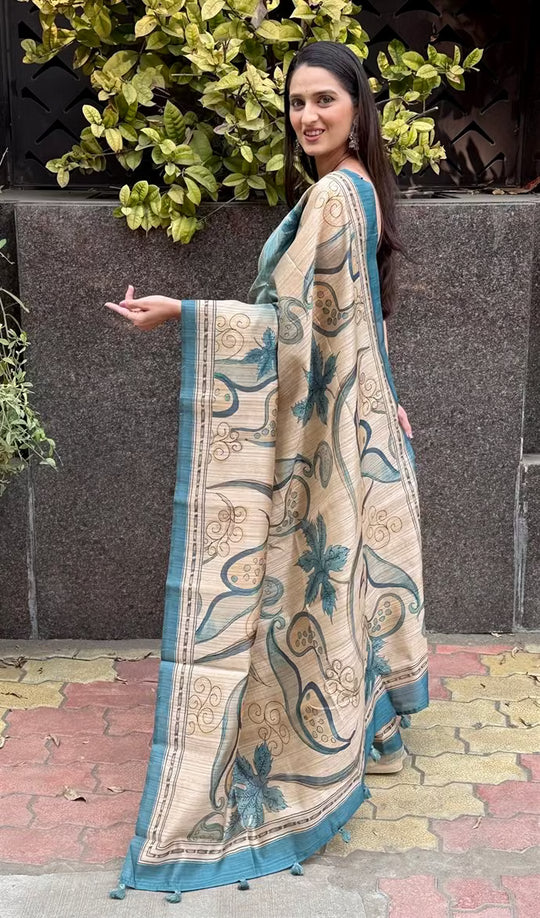 Woman in Cyan & Beige Botanical Soft silk saree. 