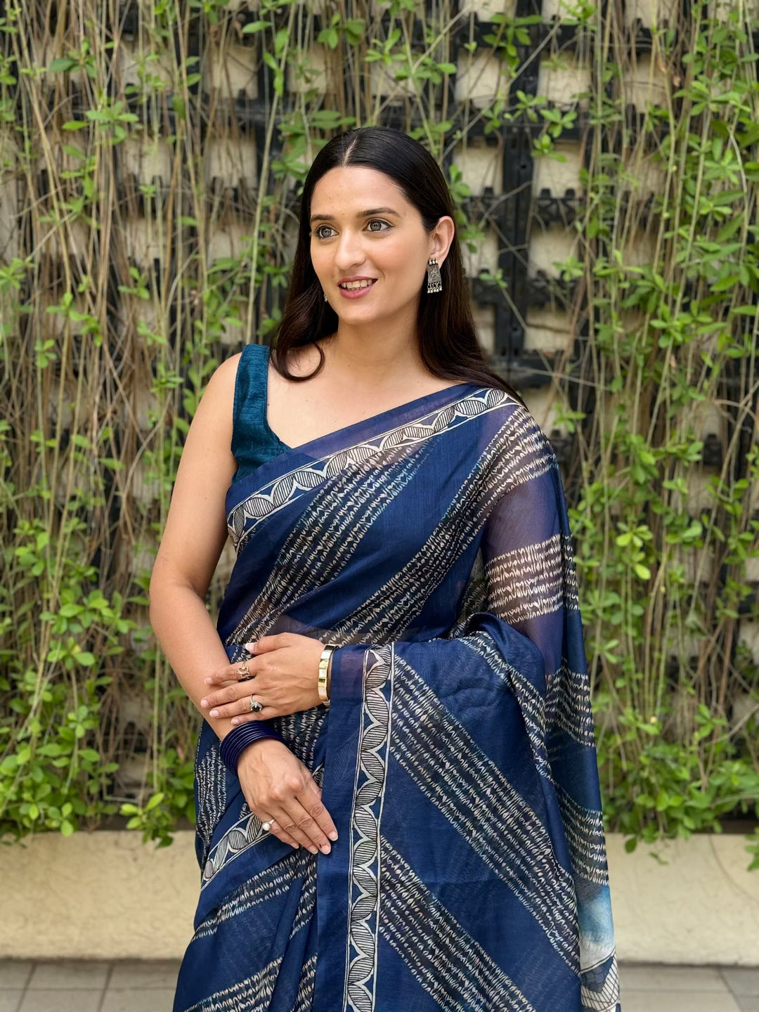 Woman wearing Deep Blue Chanderi Silk Saree.