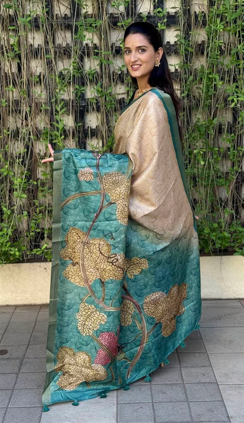 Woman wearing Teal Green Saree in Botanical Print.