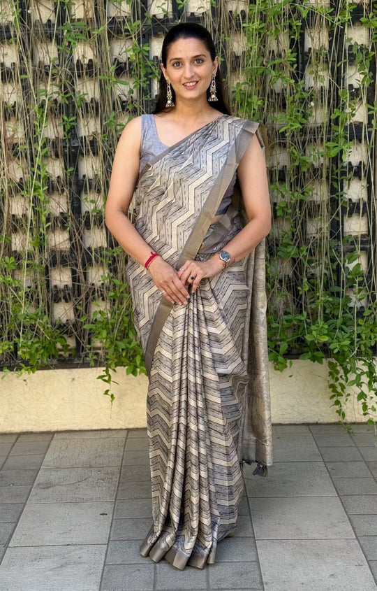 Woman wearing Metallic Grey Saree by Ethnic Today.
