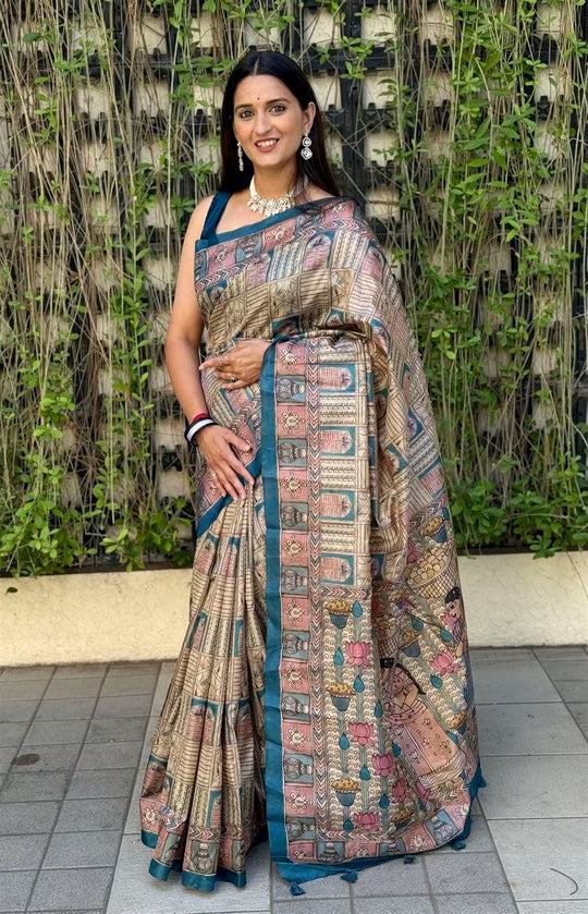 Woman wearing Cream with Teal Blue Border in Geometric Print Saree.