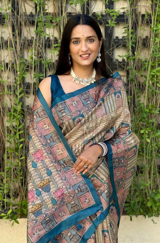 Woman wearing Teal Border Lotus Grid Chanderi Silk Saree.