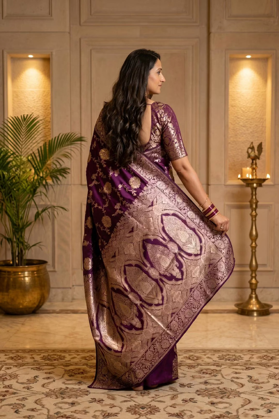 Woman in Royal Purple Jacquard saree by Ethnic Today.