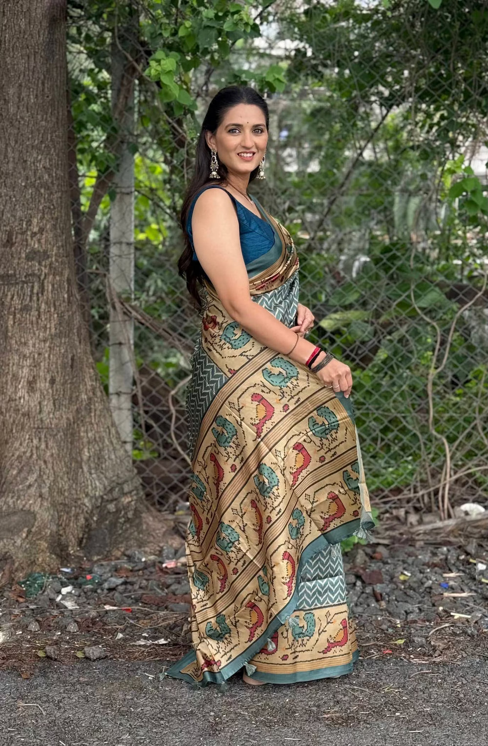 Woman in Teal Blue with Biege color border in chevron print by Ethnic Today.