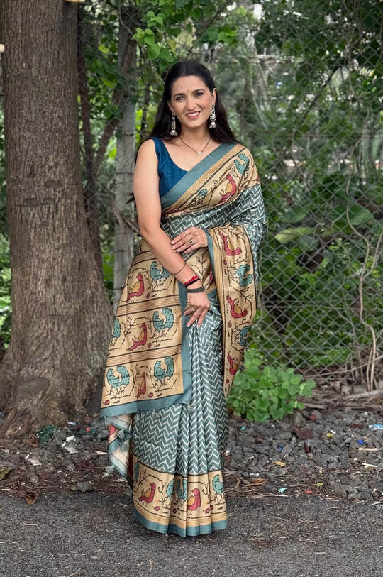 Woman in Teal Blue with Biege color border in chevron print .