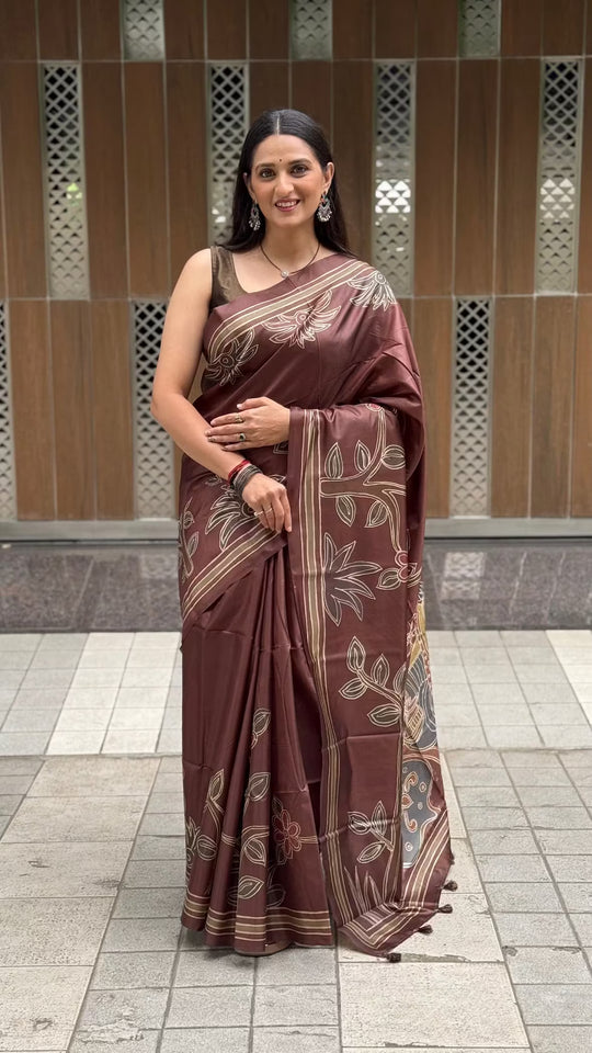 A Woman in chocolate brown saree by Ethnic Today.