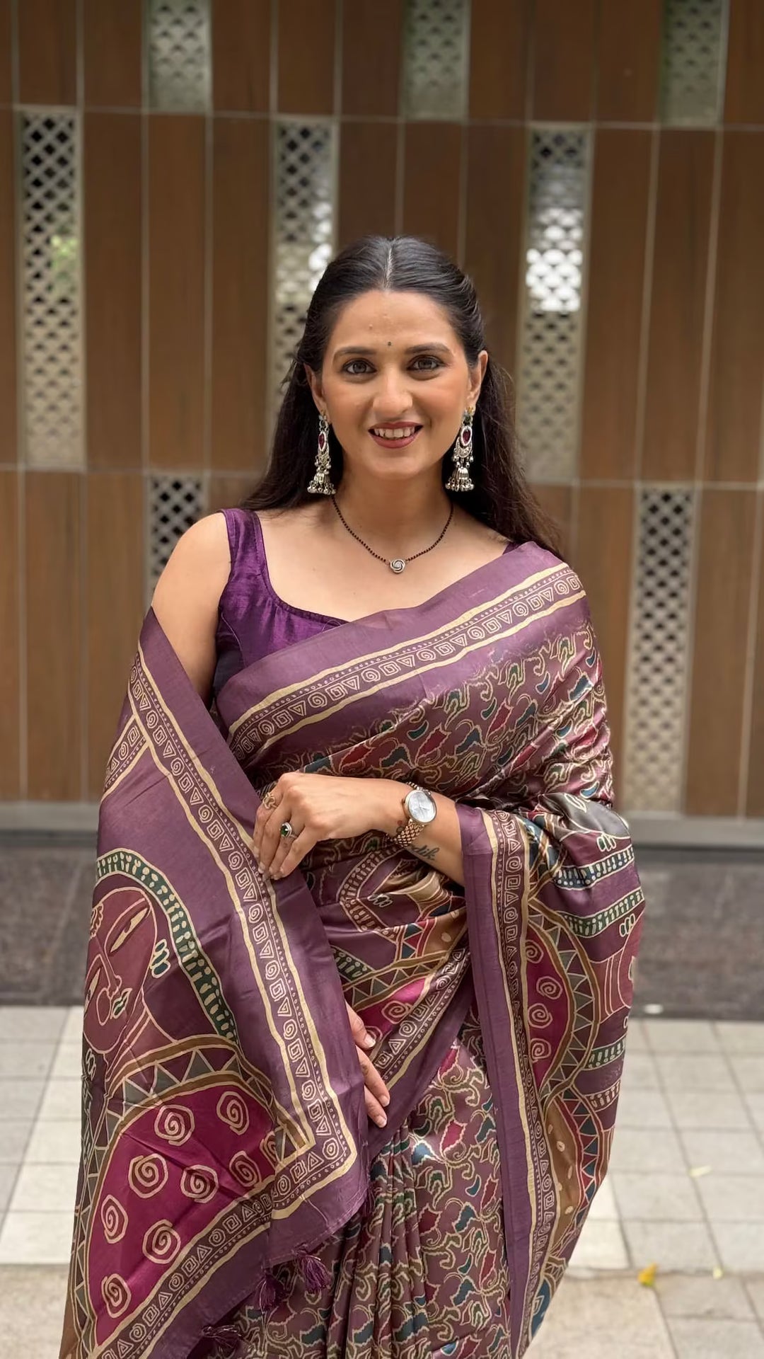 Woman in Plum Wine Abstract Tribal Tussar Silk Saree.