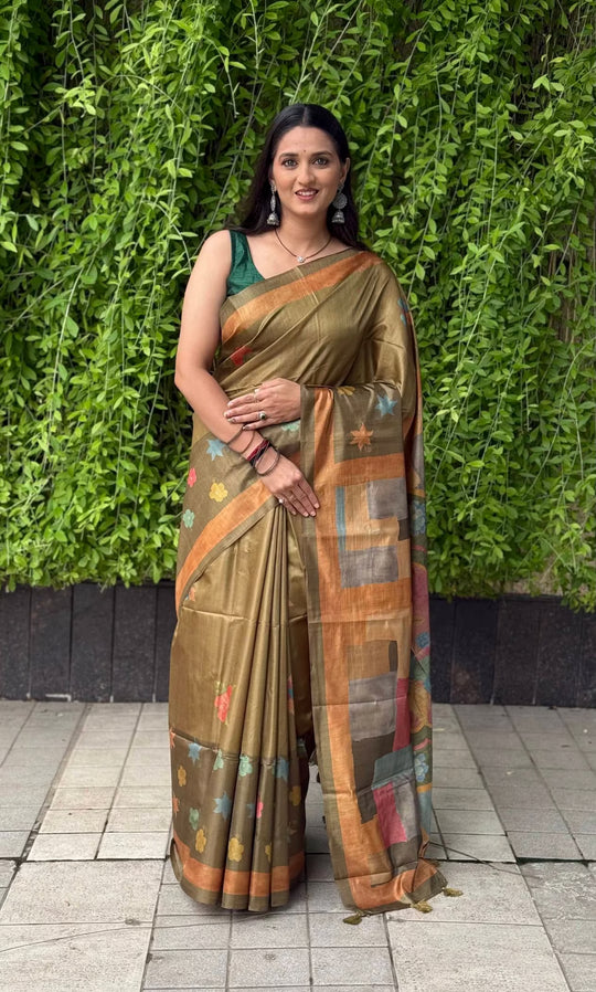Woman wearing Mehndi color sareee by Ethnic Today.