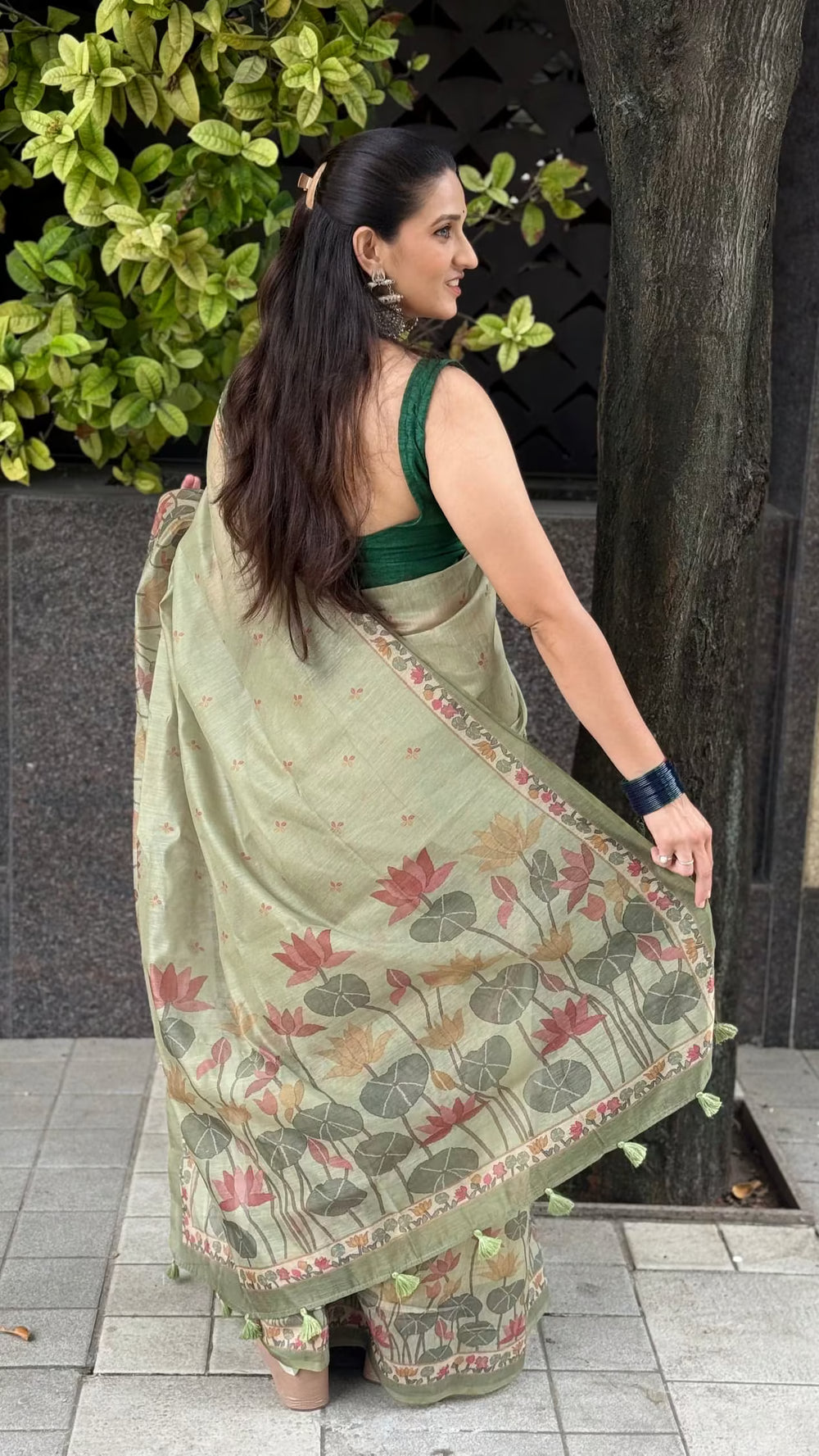 Woman in Pistachio Olive Lotus Pond Chanderi Silk Saree by Ethnic Today.