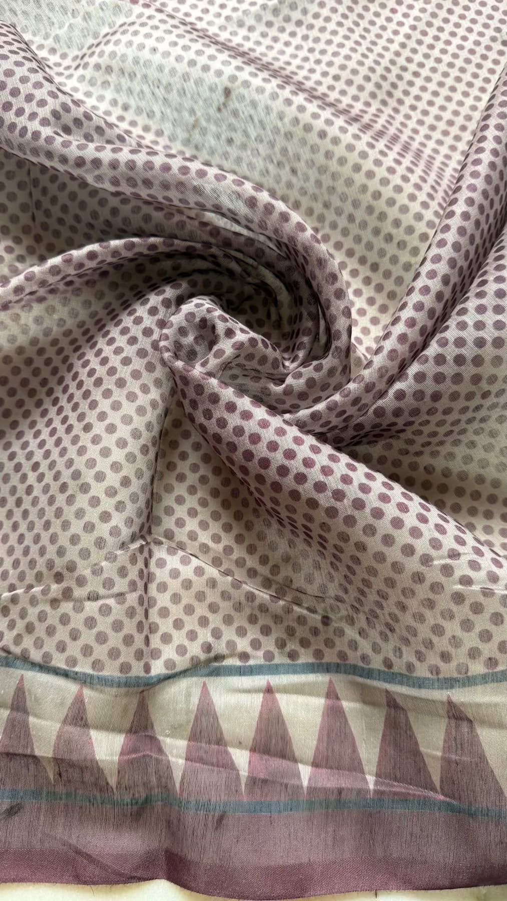 Polka dot printed blouse fabric with temple border for woman.
