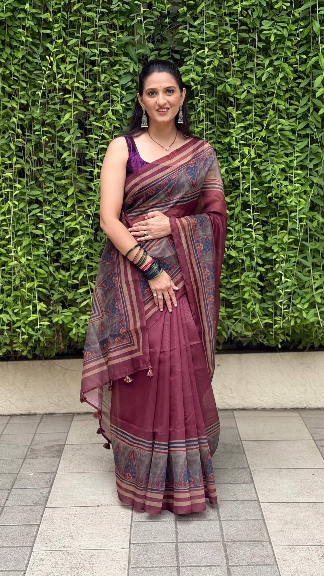 Woman in Deep wime digital printed chanderi silk saree.