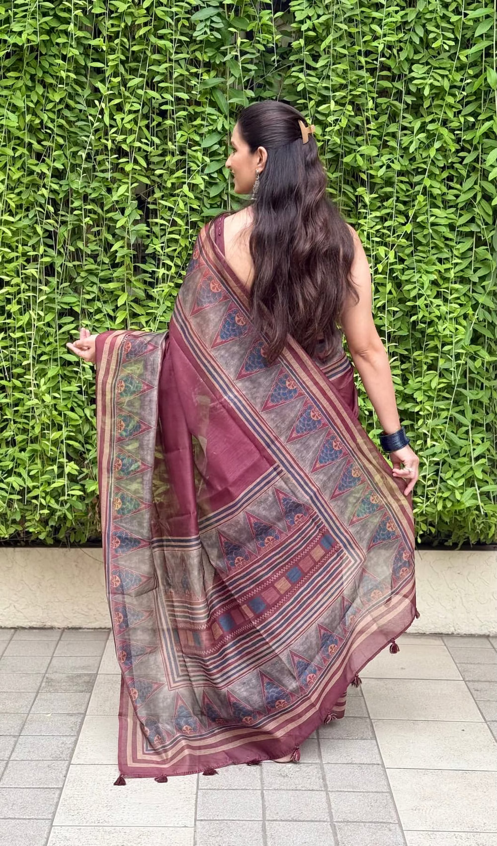 Woman in Deep Wine Triangle Floral & Geometric Motif Saree an Ethnic Today saree.