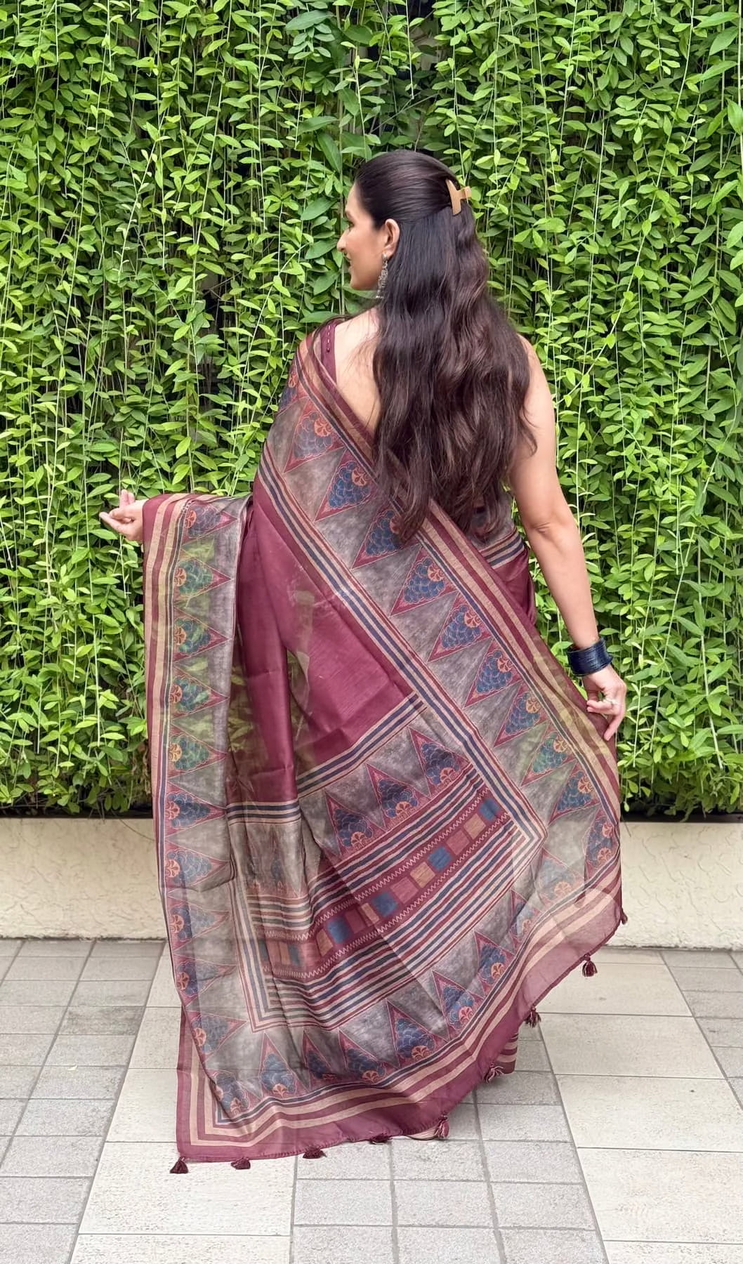 Woman in Deep Wine Triangle Floral & Geometric Motif Saree an Ethnic Today saree.