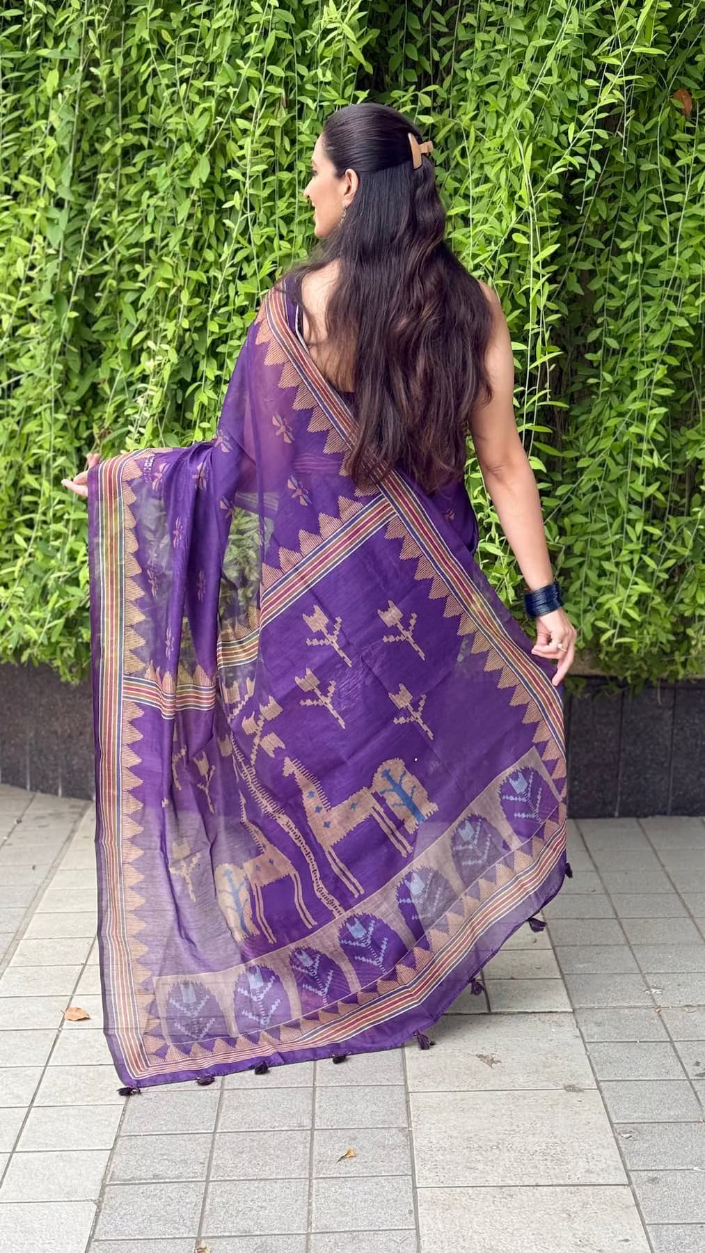 Woman in Royal Purple Geometric with Wildlife Pallu Saree by Ethnic Today.