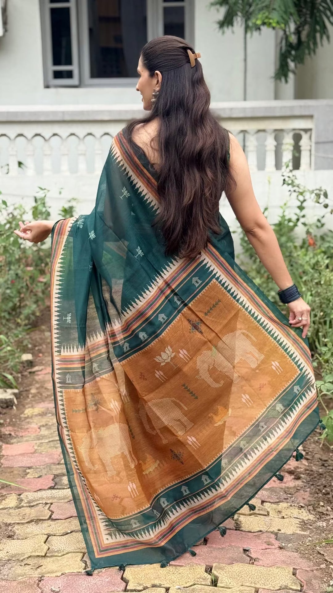 Woman in Bottle Green Lotus Butti Chanderi silk saree by Ethnic Today.