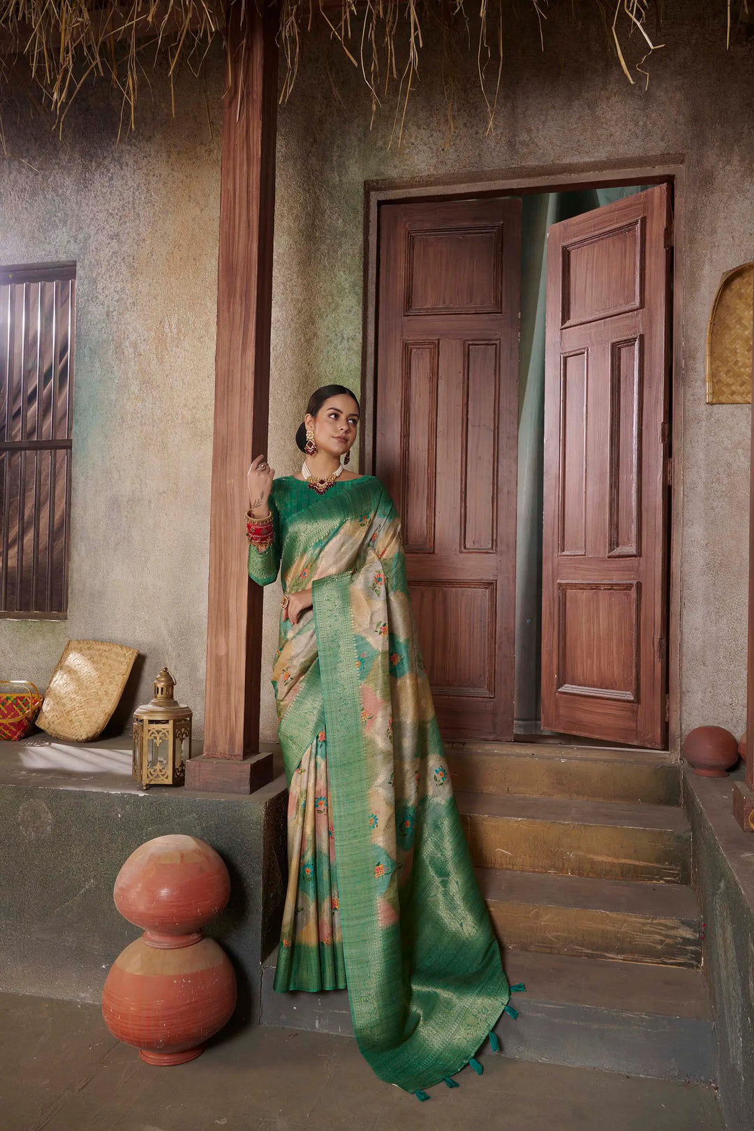 Woman in Green Flower Position printed saree.