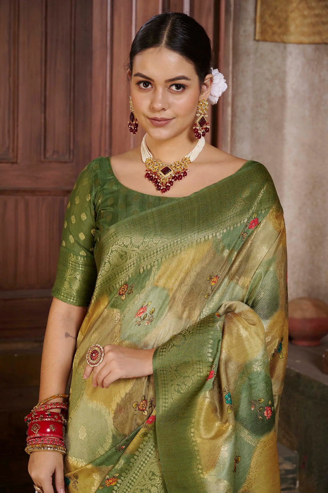 Green Position print saree for woman by Ethnic today.