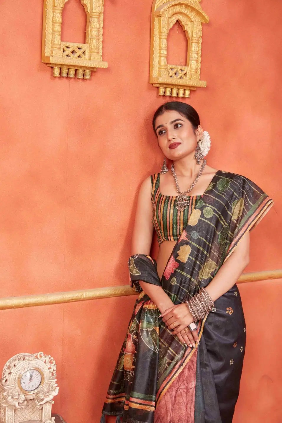 Woman in Black Pichwai Chanderi printed saree.