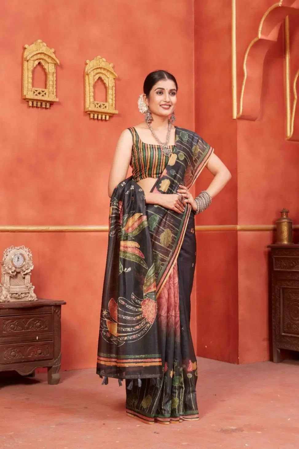 Woman in Black Pichwai Chanderi printed saree.