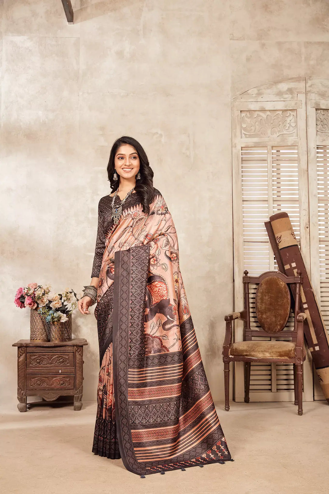 Woman in Hathi Kalamkari Dia silk Saree.